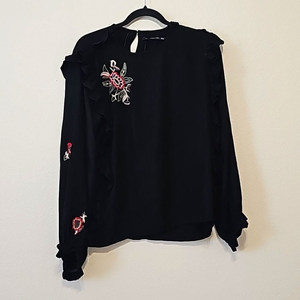 Outfitters woman embroidered ruffled top size large